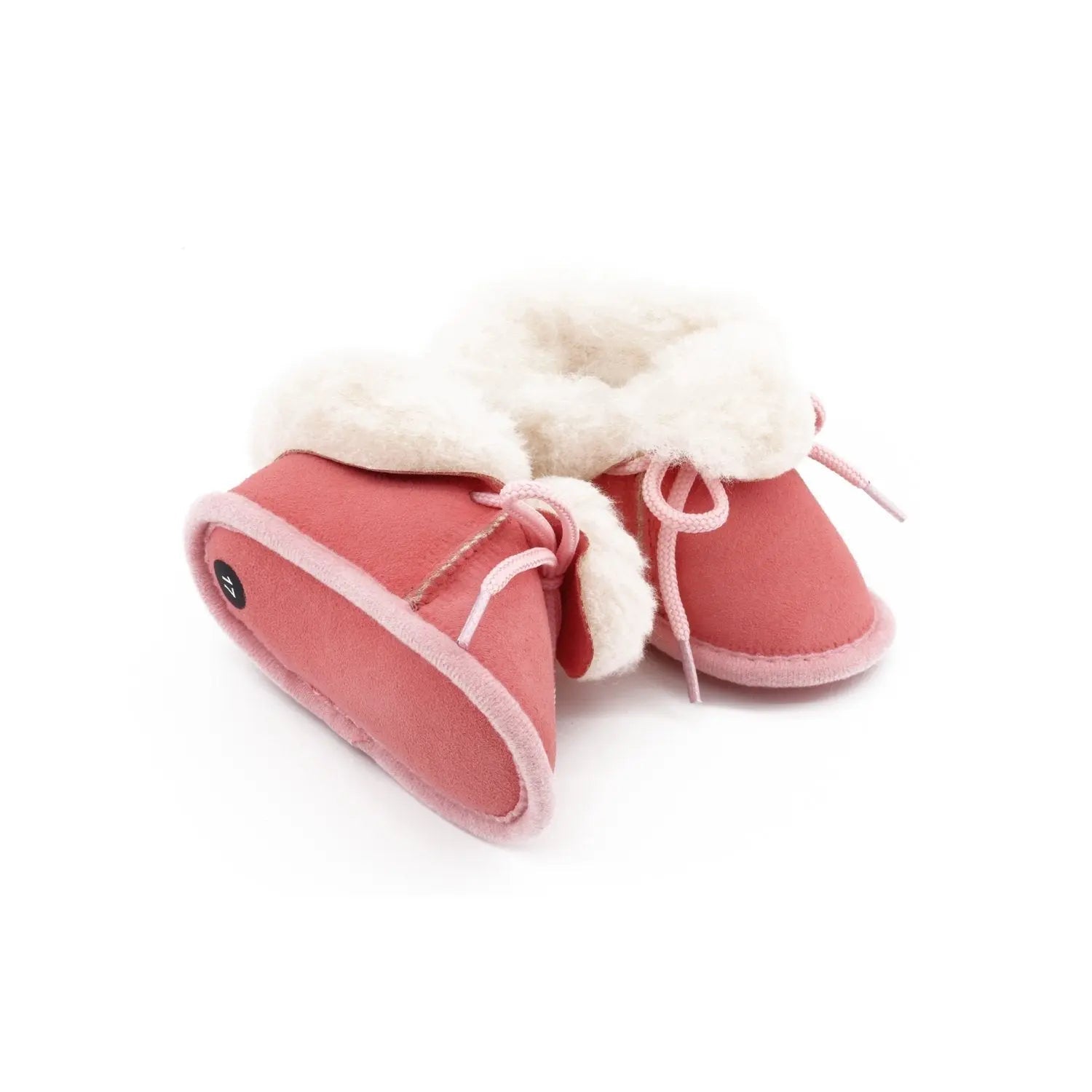 Chaussons bébé rose en peau de mouton - Dgrandiose